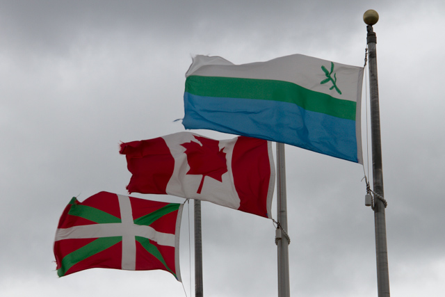 Three flags at the site: Basque, Canada, Labrador, soon to be joined by the United Nations flag
